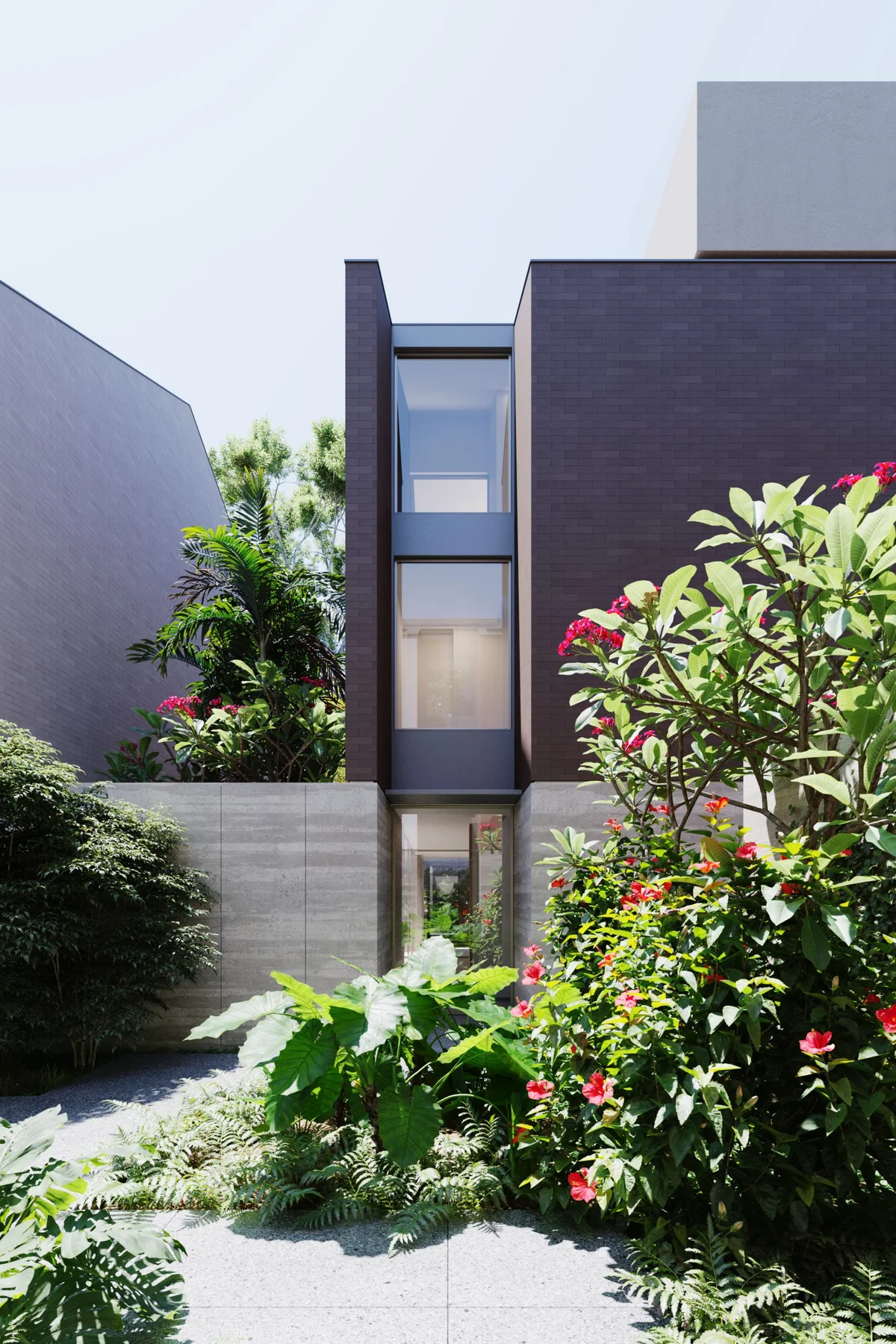 Fachada lateral da casa do Casas Oás, com vegetação e muro em tijolo